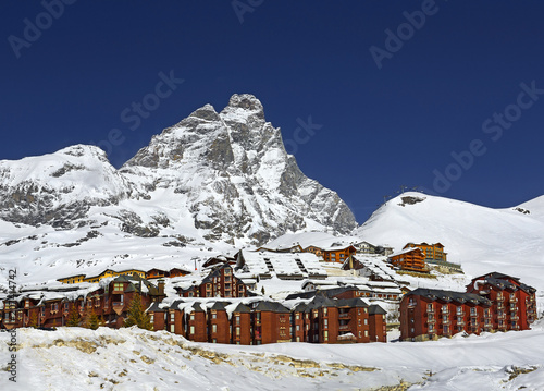 Panoramic view on Matterhorn peak - Monte Cervino, Italy. Mountain situated on the border between Switzerland and Italy, over the Swiss Zermatt and the Italian town of Breuil-Cervinia