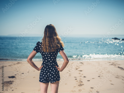 Beautiful young woman on the beach