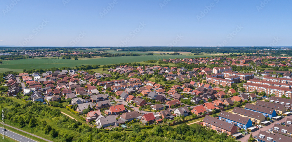 Aerial view of a suburb on the outskirts of Wolfsburg in Germany, with terraced houses, semi-detached houses and detached houses