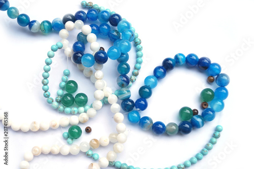 bundles of beads from turquoise, jadeite and agate