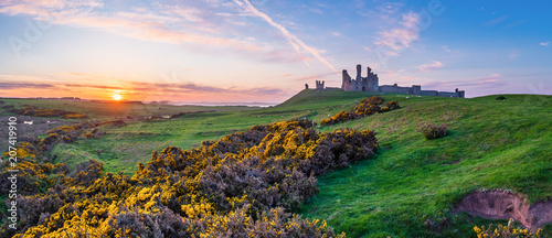 Dunstanburgh Castle Panorama at Sunset / Located between Craster and Embleton in Northumberland on the North East Coast