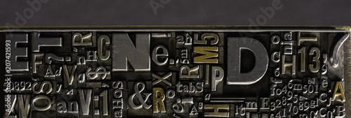 Metal Letterpress Types.
A background from many historical typography letters in black and white with white background.