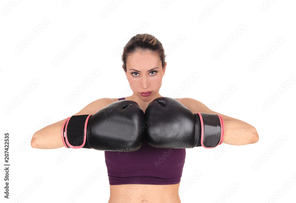 Woman with boxing gloves looking, smiling Woman with boxing gloves looking, smiling