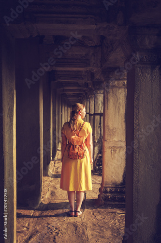 Tourist woman in the temple of Angkor Wat. © lizavetta