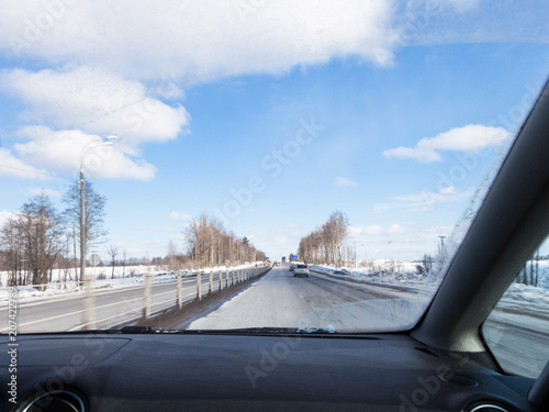 driving along M1 highway in Russia in wither day