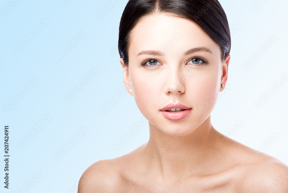 Fototapeta premium Сloseup beauty portrait. The face of a beautiful young woman