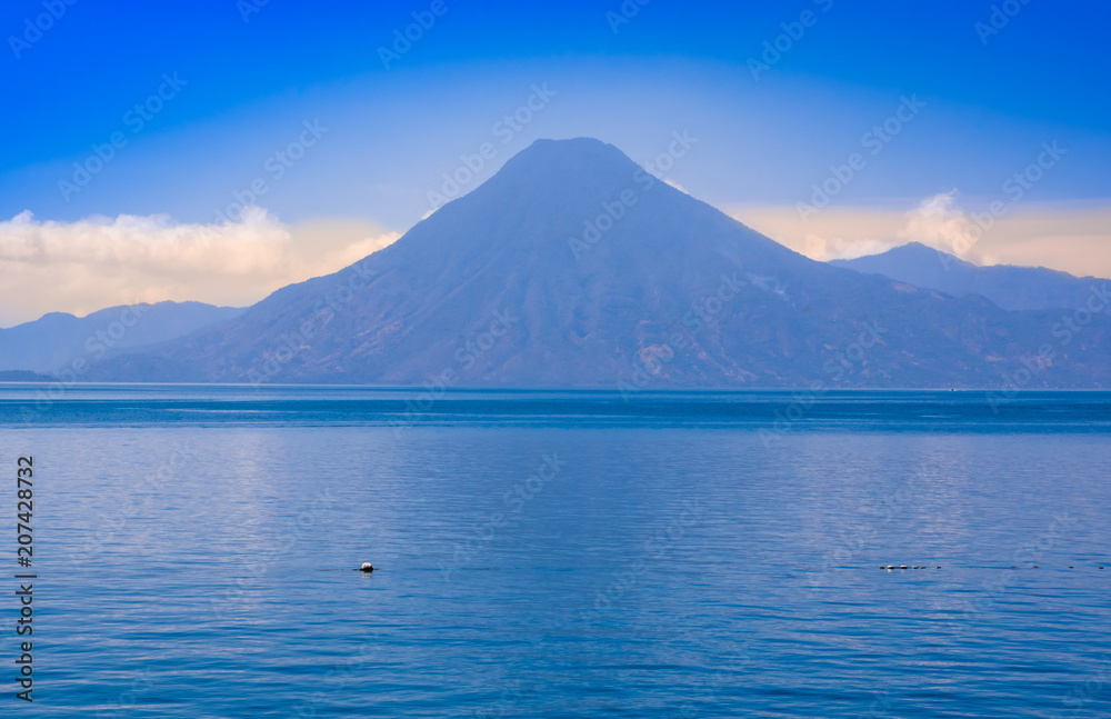 Beautiful landscape of Atitlan Lake, is the deepest lake in all of Central America with a maximum depth of about 340 meters, with volcano in Background