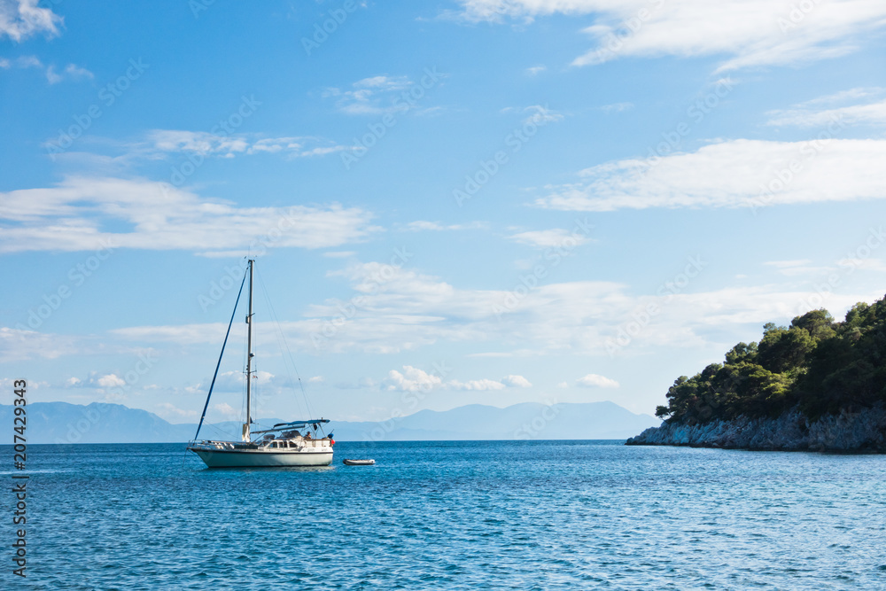 Sailboats at Limnonary bay, sunny morning at Skopelos island, Greece