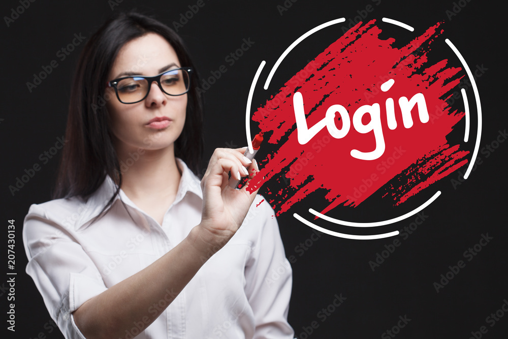 The concept of marketing, technology, the Internet and the network. A young businessman shows what is important for business: Login The concept of marketing, technology, the Internet and the network. A young businessman shows what is important for business: Login