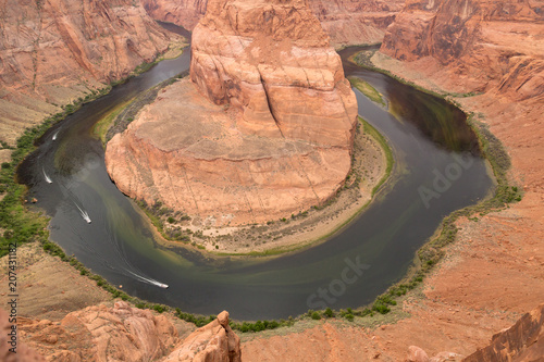 Boats on the river in the canyon colorado horseshoe bend