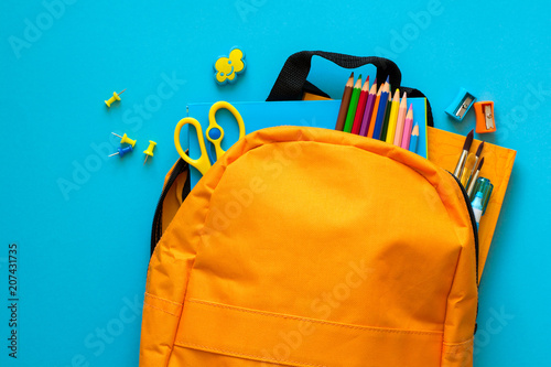 Back to school concept. Backpack with school supplies. Top view. Copy space photo