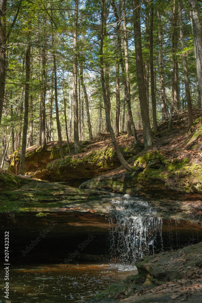 Small Stream Waterfall in Midwest Forest Woods Small Stream Waterfall in Midwest Forest Woods