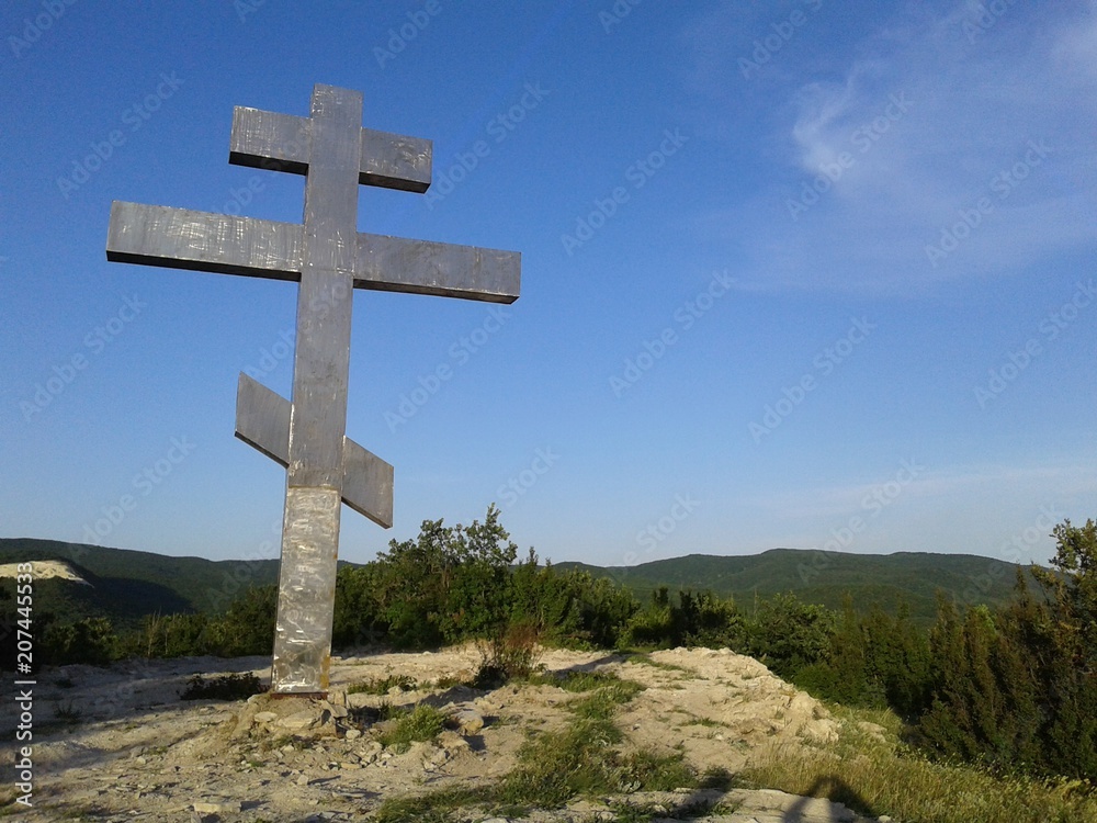 Big cross on the mountain. beautiful nature.