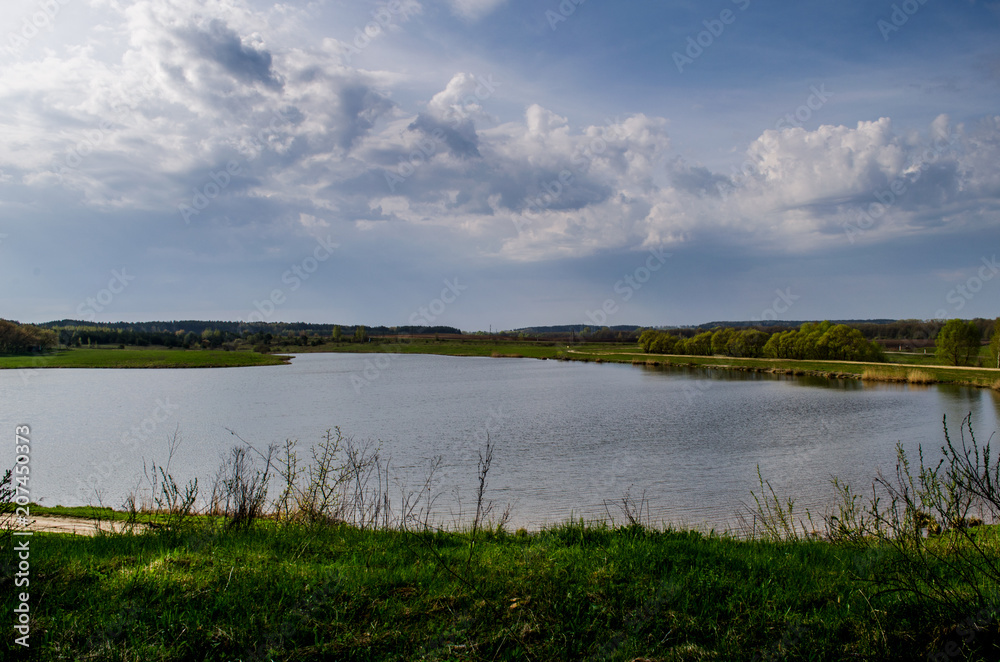 View of the lake from the hill. A place for rest and fishing. Nature reserve