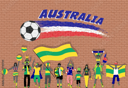 Australian football fans cheering with Australia flag colors in front of soccer ball graffiti photo