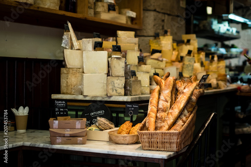 Store front selling breads, hard cheeses, baguette and traditional scottish food.