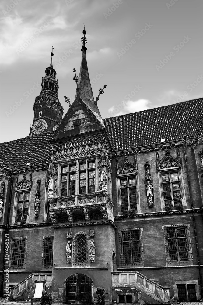 Wroclaw Town Hall at Market Square against bright summer sky. Historical capital of Silesia Poland, Europe. Travel vacation concept. Black and White
