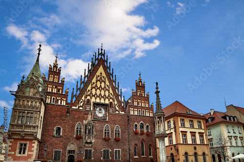 Wroclaw Town Hall at Market Square against bright summer sky. Historical capital of Silesia Poland, Europe. Travel vacation concept