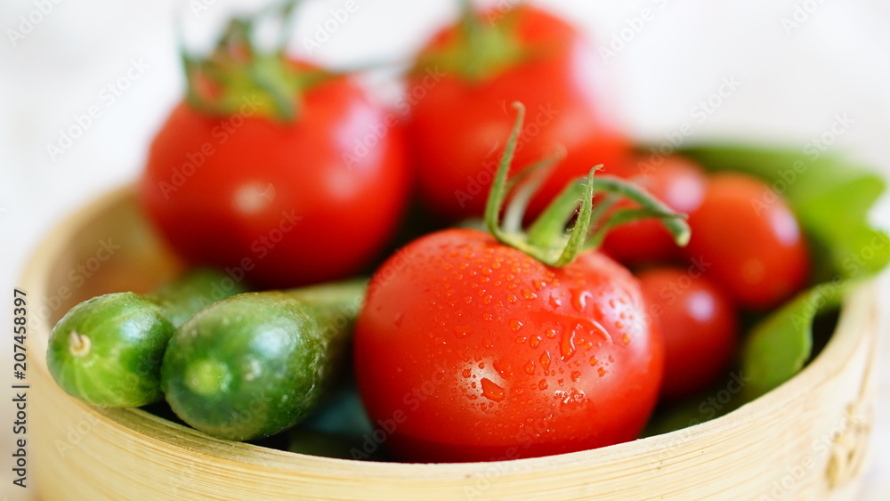 fresh organic vegetable. Tomatoes, cherry tomatoes, cucumber with white background fresh organic vegetable. Tomatoes, cherry tomatoes, cucumber with white background