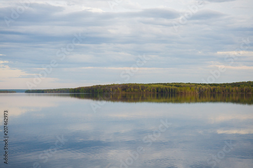 beautiful  picturesque nature. The lake is surrounded by forest.