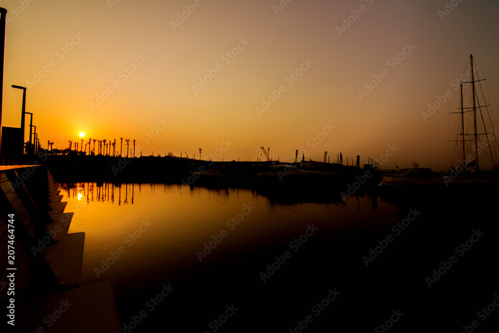 Majestic sunrise. Dramatic colorful sky over lake.