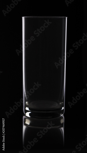 Low-key photography: glass on black background