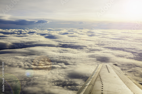 View from airplane window. sky as seen through window of an aircraft. Airplane window. Bird's-eye.Travel by air. background for travel and journey concept. jet plane above the mountains