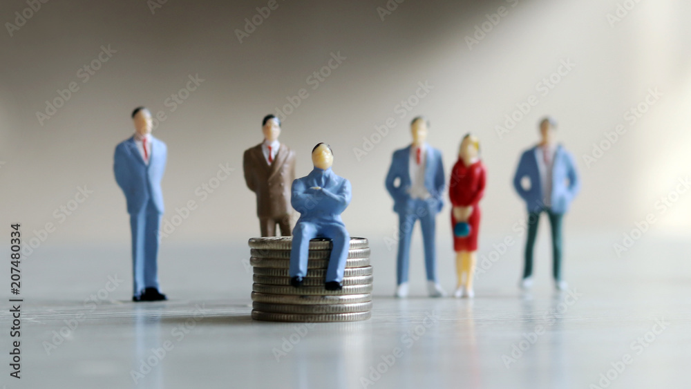 Money and leadership. The man sitting on the coin and peoples standing behind it. Money and leadership. The man sitting on the coin and peoples standing behind it.