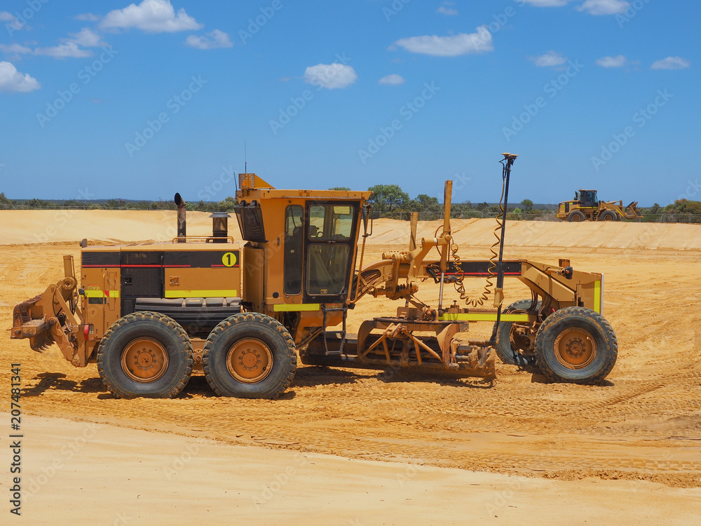 Heavy machinery working on construction site Heavy machinery working on construction site