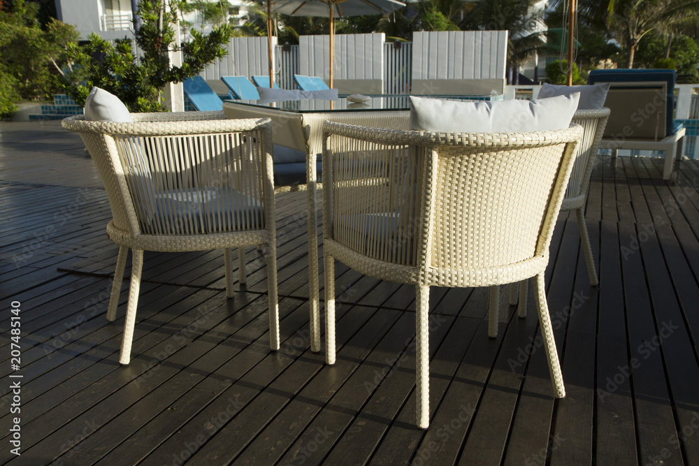Outdoor table set with umbrella in the terrace Outdoor table set with umbrella in the terrace