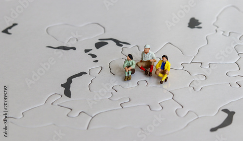 Miniatures on the world map puzzles.