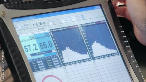 close-up of worker hand using equipments of sound and noise level measurement