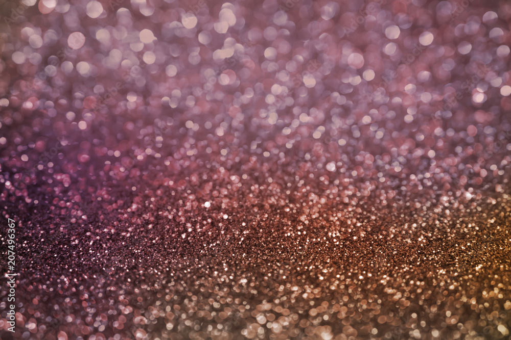 defocus soft pink and purple bokeh texture background with glitter light 