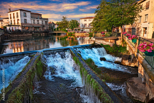 L'Isle-sur-la-Sorgue, Vaucluse,.France: landscape at dawn of the town surrounded of the water canals