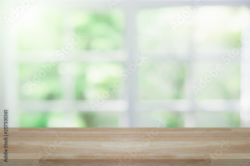Empty wooden table and window room interior decoration background, product montage display,can be used for display or montage your products.Mock up for display of product.