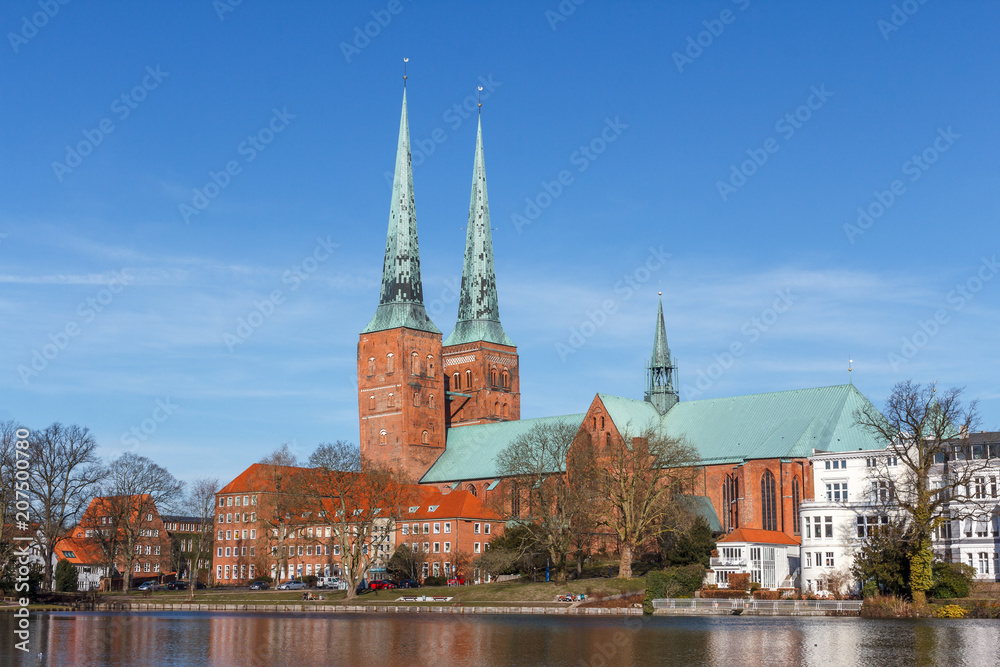 Twin bell-towers of the medieval Gothic church in Lubeck, Germany