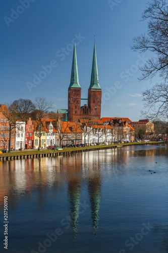 Twin bell-towers of the medieval Gothic church in Lubeck, Germany