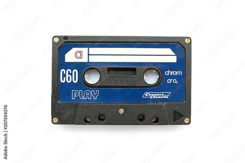 Vintage audio cassette tape isolated white background Compact cassette for play and recording analog music in 80s Nostalgic and obsolete instrument to listen music Music collectors love these objects