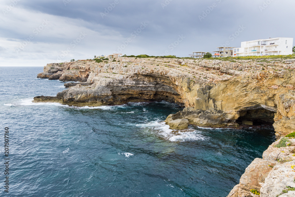Mallorca, Rough cliff near Sa Punta next to fishing village Porto Colom