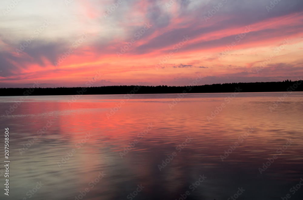 fantastic landscape, multicolor sky over the lake.