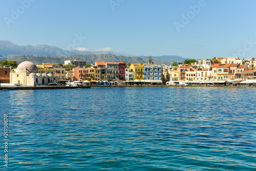 Wallpaper Mural Gastronomy in the old buildings of the harbor promenade of Chania. On left, the famous Hasan Pasha Mosque in the historical old town	 Torontodigital.ca