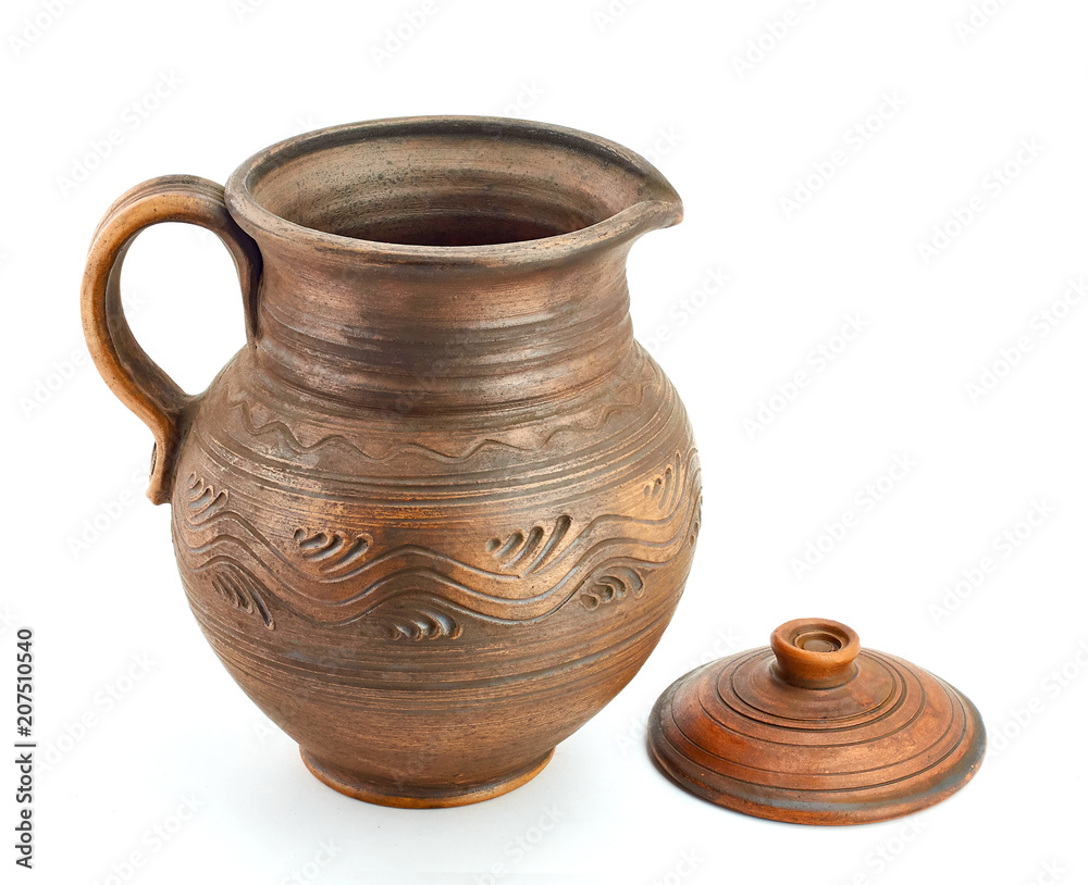 clay ethnic dishes on white background