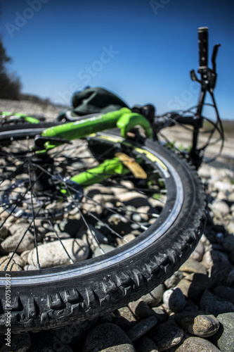 Bicycle adventure trip tour outdoors background. Bicycle tire close-up. photo