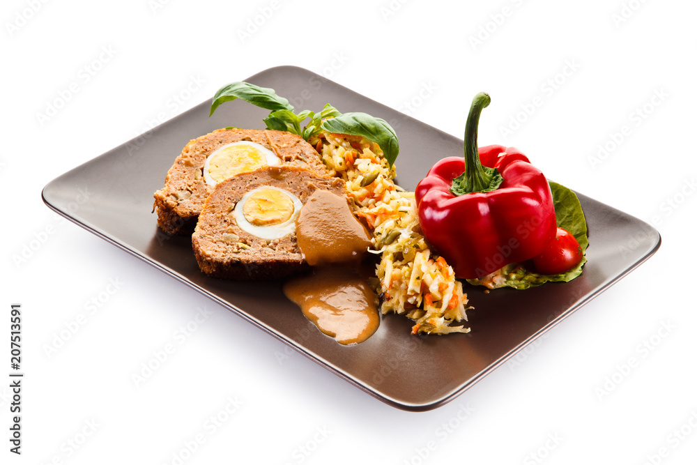 Meatballs stuffed with boiled eggs with vegetables Meatballs stuffed with boiled eggs with vegetables
