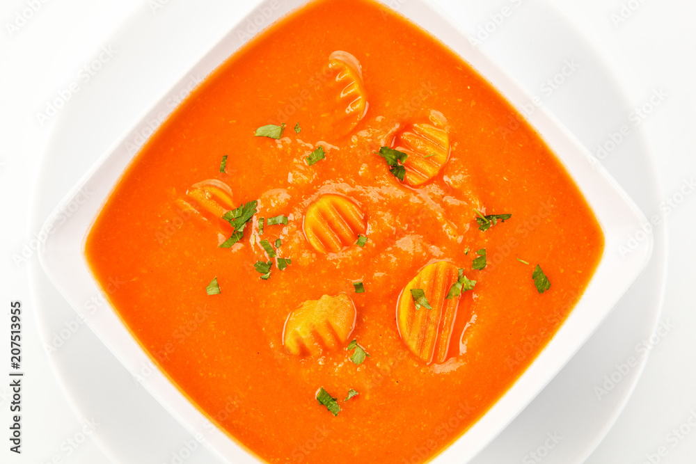 Carrot soup on white background Carrot soup on white background