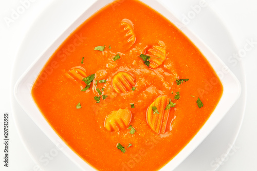 Carrot soup on white background