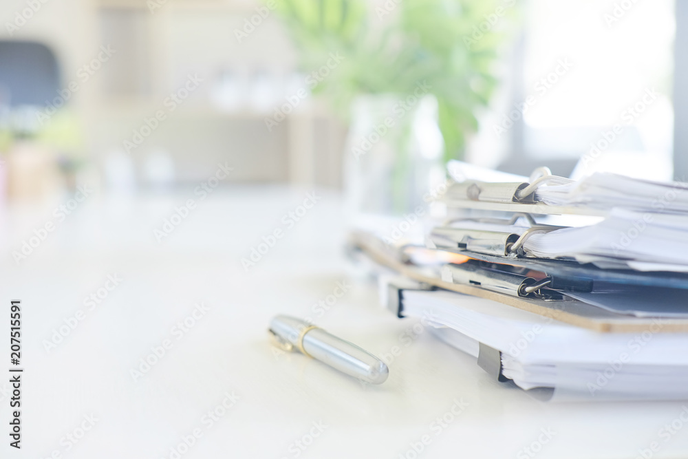 Stack of paper files and pen business equipment on office table. - obrazy, fototapety, plakaty 
