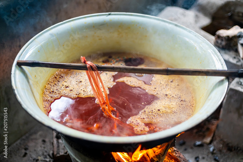 Boiling Fabric in the Pot to Natural Tie and Dye a Procedure to make Mudmee or Ikat Weaving