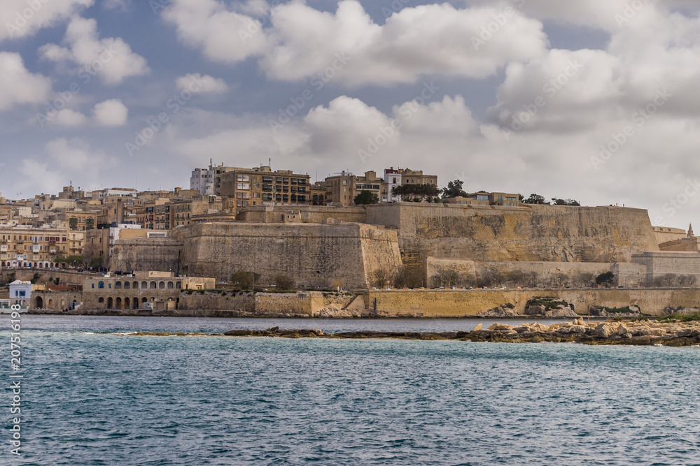 Valletta, Malta, skyline od capitol city with blue cloudy sky as background