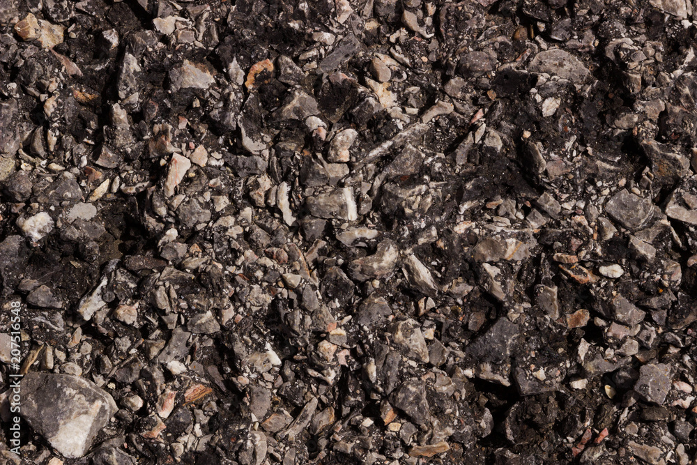 Rough dark black and gray asphalt on for industrial road background. Close-up Rough dark black and gray asphalt on for industrial road background. Close-up